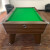The Blackball pool table in walnut.