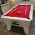 The Blackball slate bed pool table in white.