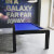 The Black Imperio pool table displayed in a room.