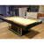 The London Slate Bed pool table in a room.