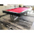 The Pixel slate bed pool table with red cloth.