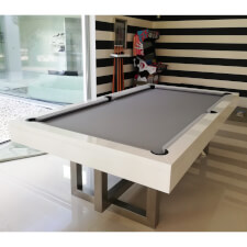 The Pixel slate bed pool table in a room in glossy white.