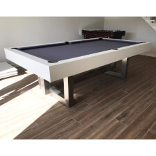 The Pixel slate bed pool table in a room.