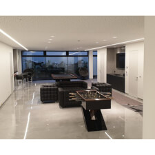 The Olympus Football table in a room.