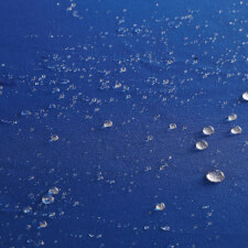 The waterproof billiard cloth on the California pool table.