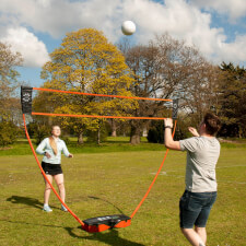A girl playing Sure Shot Quick Fit 3 in 1 game.