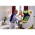 Couple playing Golden Tee arcade machine