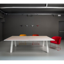 The Grasshopper tennis table in a room.