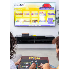 People playing Arcade1UP Pacman Couchcade.