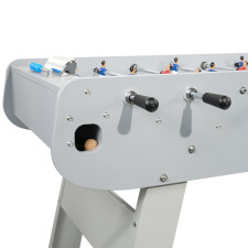 The Baby-foot Tahiti outdoor 6 players football table ball exit.