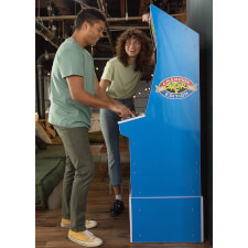 People playing Arcade1Up Street Fighter II Blue Machine.