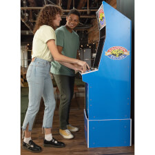 People playing Arcade1Up Street Fighter II Blue Machine.