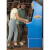 People playing Arcade1Up Street Fighter II Blue Machine.