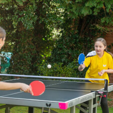 People playing Butterfly Garden Rollaway 8000.
