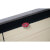 A puck on the shuffleboard play surface