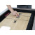 Taking a shot on the Home Shuffleboard.