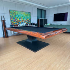 The Graal slate bed pool dining table in Ironwood finish.