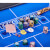 The contents of the chip set on a poker table.