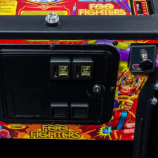 The Foo Fighters premium pinball cabinet coin mechanism.
