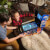 Family playing on the Pinball Micro.