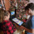 Family playing on the Pinball Micro.