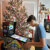 Family playing on the Pinball Micro.
