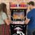 People playing Arcade1Up NBA Jam machine.