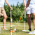People playing Croquet Family set.