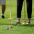 People playing Croquet Pro 4-Mallet set.