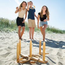 People playing Ring Toss Game.