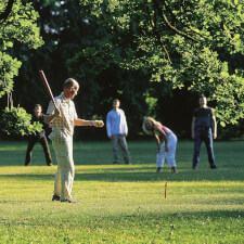 People playing Rounders family set.