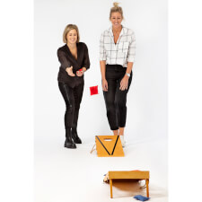 People playing Cornhole Bean Bag game.