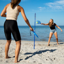 People playing Tether Ball game.