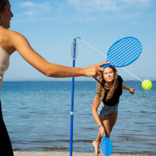 People playing Tether Ball game.