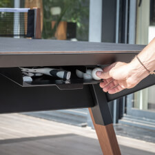 The Cornilleau Lifestyle Medium Pool Table in Black/Dark Stone Accessory Storage.