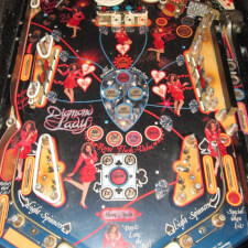 Refurbished Diamond Lady pinball machine playfield.