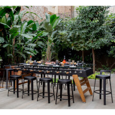 The RS Max Dining Table in Black With Stools.