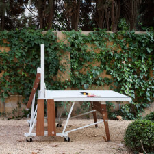 The RS Ping Pong Half Folded Table in White.