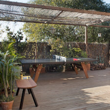 The RS Stationary Ping Pong Table in Black Outdoor.