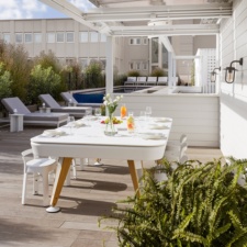 The Diagonal Outdoor Pool Dining Table In White.