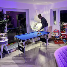 Playing a game of pool on the Tekscore Compact.