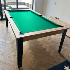 The Pureline Regal Pool table with green cloth.