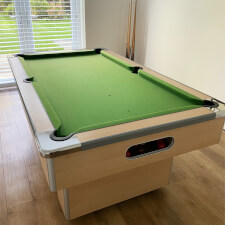 the Slimline table in oak and green cloth.