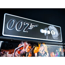 The Stern James Bond 007 60th Anniversary pinball machine marquee.