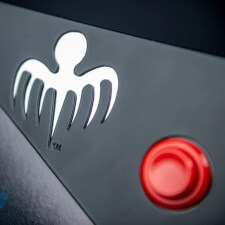 The Stern James Bond 007 60th Anniversary pinball machine button.