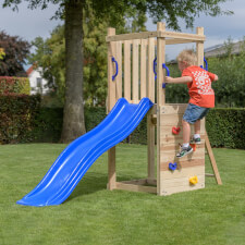 A kid playing in the Mari Wooden Playcentre.