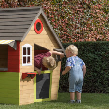 Kids playing in the Fairytale playhouse.