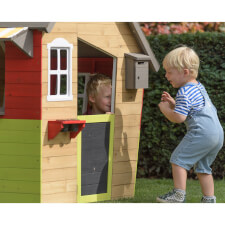 Kids playing in the Fairytale playhouse.