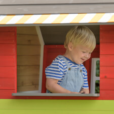 Kids playing in the Fairytale playhouse.