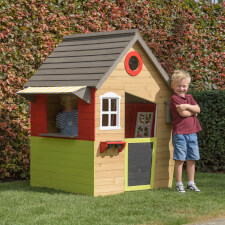Kids playing in the Fairytale playhouse.